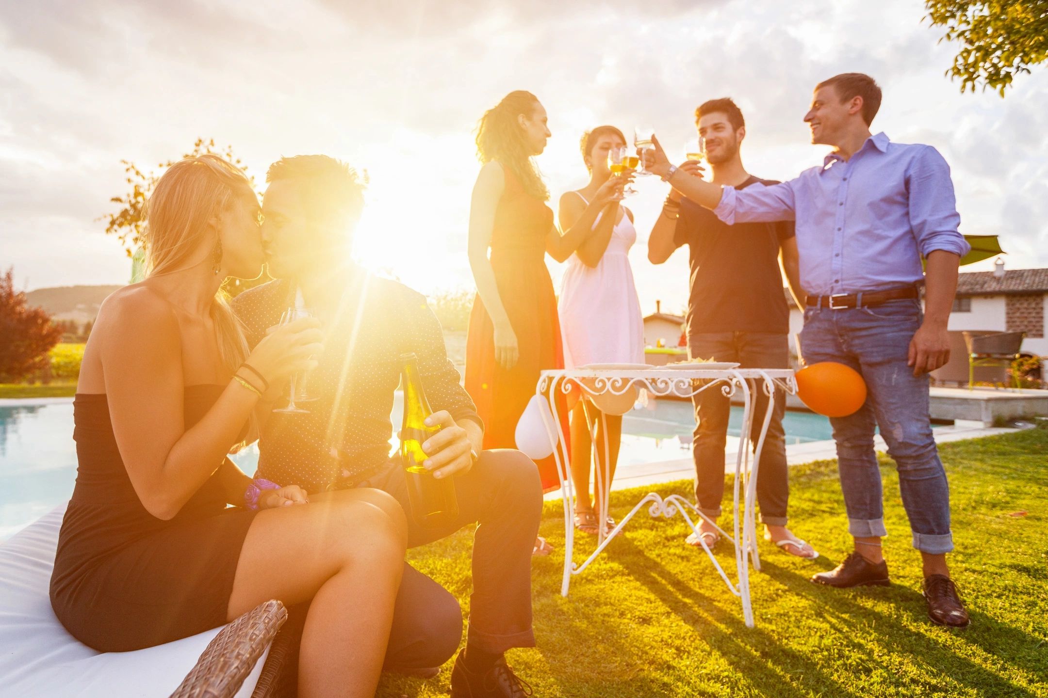 Group of young adults at outdoor garden party